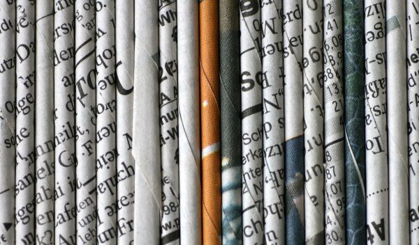 Rolled Newspaper Pages