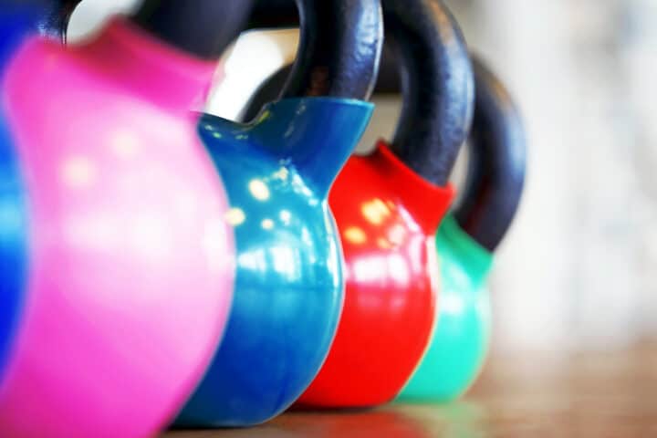 Colorful Kettlebells in Gym